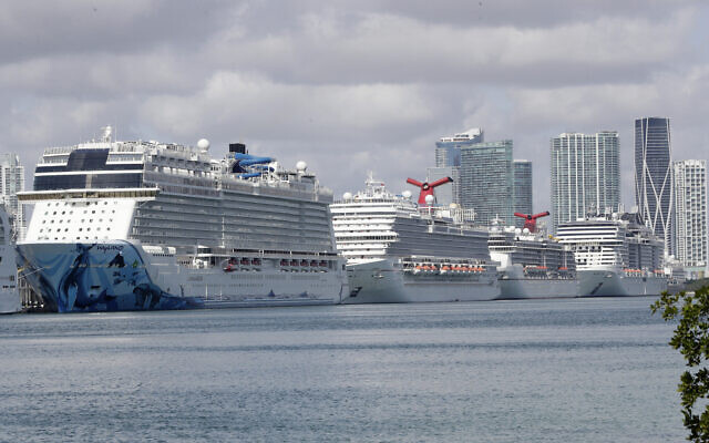 Cruise ships are docked at PortMiami on March 31, 2020, in Miami. (AP Photo/Wilfredo Lee) Cruise ships are docked at PortMiami on March 31, 2020, in Miami. (AP Photo/Wilfredo Lee)