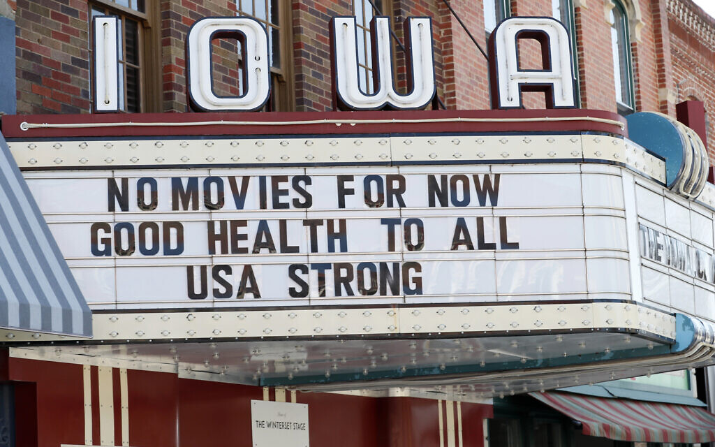 The marquee for the Iowa Theater, closed in response to the coronavirus outbreak, is seen on John Wayne Drive, Wednesday, April 1, 2020, in Winterset, Iowa.(AP Photo/Charlie Neibergall) The marquee for the Iowa Theater, closed in response to the coronavirus outbreak, is seen on John Wayne Drive, Wednesday, April 1, 2020, in Winterset, Iowa.(AP Photo/Charlie Neibergall)