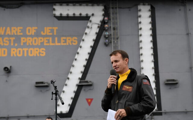 In this Nov. 15, 2029, photo US Navy Capt. Brett Crozier, commanding officer of the aircraft carrier USS Theodore Roosevelt (CVN 71), addresses the crew during an all-hands call on the ship's flight deck while conducting routine operations in the Eastern Pacific Ocean. (US Navy Photo by Mass Communication Specialist 3rd Class Nicholas Huynh via AP) In this Nov. 15, 2029, photo US Navy Capt. Brett Crozier, commanding officer of the aircraft carrier USS Theodore Roosevelt (CVN 71), addresses the crew during an all-hands call on the ship's flight deck while conducting routine operations in the Eastern Pacific Ocean. (US Navy Photo by Mass Communication Specialist 3rd Class Nicholas Huynh via AP)