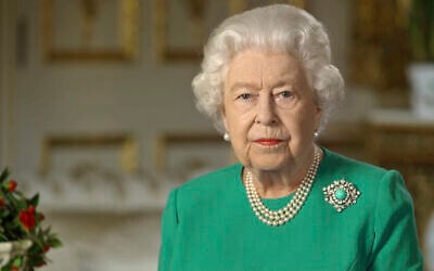 In this image taken from video and made available by Buckingham Palace, Britain's Queen Elizabeth II addresses the nation and the Commonwealth from Windsor Castle, Windsor, England, Sunday April 5, 2020. Queen Elizabeth II made a rare address, calling on Britons to rise to the challenge of the coronavirus pandemic, to exercise self-discipline in “an increasingly challenging time”. (Buckingham Palace via AP)