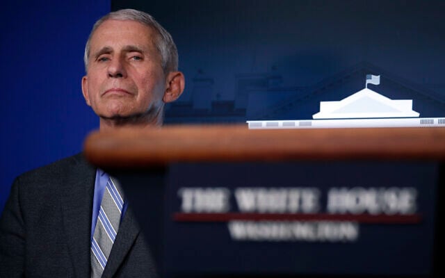 Dr. Anthony Fauci, director of the National Institute of Allergy and Infectious Diseases, listens during a briefing about the coronavirus in the James Brady Press Briefing Room of the White House, Wednesday, April 8, 2020, in Washington. (AP Photo/Alex Brandon) Dr. Anthony Fauci, director of the National Institute of Allergy and Infectious Diseases, listens during a briefing about the coronavirus in the James Brady Press Briefing Room of the White House, Wednesday, April 8, 2020, in Washington. (AP Photo/Alex Brandon)