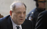 Harvey Weinstein arrives at a Manhattan court as jury deliberations continue in his rape trial, on February 21, 2020. (AP Photo/Mark Lennihan, File)