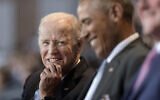 Then-US vice president Joe Biden, left, watches then-US president Barack Obama, center, at Conmy Hall, Joint Base Myer-Henderson Hall, Virginia, on January 4, 2017  (AP Photo/Susan Walsh/File)