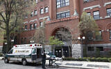 Emergency medical workers arrive at Cobble Hill Health Center, in Brooklyn, NY, April 17, 2020. (John Minchillo/AP)