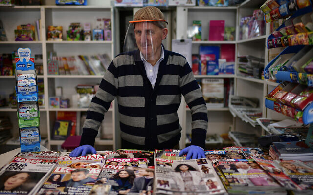 Antonio Leoz in his book shop in Pamplona, northern Spain, April 14, 2020. (AP Photo/Alvaro Barrientos) Antonio Leoz in his book shop in Pamplona, northern Spain, April 14, 2020. (AP Photo/Alvaro Barrientos)