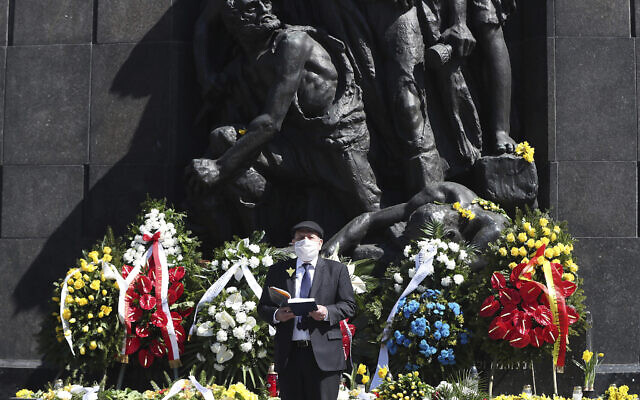 Poland's chief rabbi, Michael Schudrich, says prayers before the monument to the heroes of the 1943 Warsaw Ghetto Uprising in Warsaw, Poland, April 19, 2020. (Czarek Sokolowski/AP) Poland's chief rabbi, Michael Schudrich, says prayers before the monument to the heroes of the 1943 Warsaw Ghetto Uprising in Warsaw, Poland, April 19, 2020. (Czarek Sokolowski/AP)