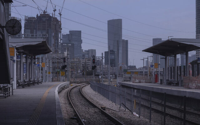 In this April 6, 2020 photo, a railway station is deserted after authorities shut down railway service in an effort to contain the spread of the coronavirus, in Tel Aviv, Israel. (AP Photo/Oded Balilty)