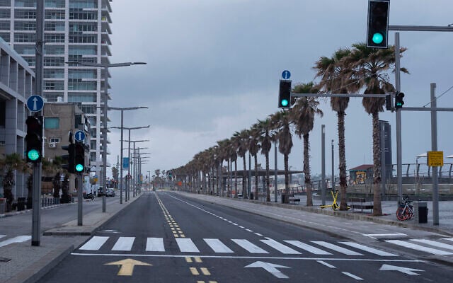 Illustrative: In this April 11, 2020, photo, Tel Aviv's beachfront promenade and a main road are empty of people during a lockdown following government measures to help stop the spread of the coronavirus in Tel Aviv. (AP Photo/Oded Balilty) Illustrative: In this April 11, 2020, photo, Tel Aviv's beachfront promenade and a main road are empty of people during a lockdown following government measures to help stop the spread of the coronavirus in Tel Aviv. (AP Photo/Oded Balilty)