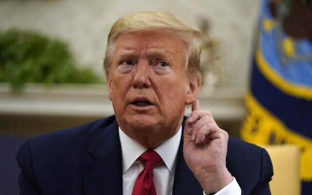 US President Donald Trump listens during a meeting about the coronavirus with Gov. John Bel Edwards, D-La., in the Oval Office of the White House, Wednesday, April 29, 2020, in Washington. (AP Photo/Evan Vucci) US President Donald Trump listens during a meeting about the coronavirus with Gov. John Bel Edwards, D-La., in the Oval Office of the White House, Wednesday, April 29, 2020, in Washington. (AP Photo/Evan Vucci)