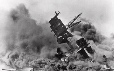 In this Dec. 7, 1941 file photo, smoke rises from the battleship USS Arizona as it sinks during a Japanese surprise attack on Pearl Harbor, Hawaii. (AP File Photo)