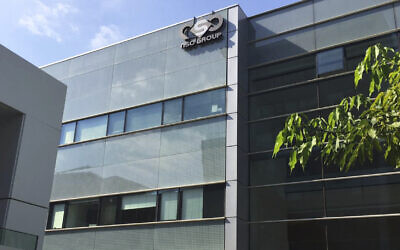 The logo of the Israeli NSO Group company on a building where they had offices in Herzliya, on August 25, 2016. (AP Photo/Daniella Cheslow)