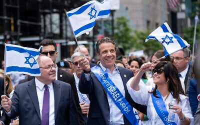 New York Governor Andrew Cuomo, center, joins other participants as they take part in the Celebrate Israel Parade, June 2, 2019, in New York. (AP Photo/Craig Ruttle)