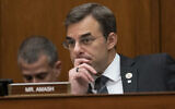 Rep. Justin Amash, R-Mich., listens to debate as the House Oversight and Reform Committee considers whether to hold Attorney General William Barr and Commerce Secretary Wilbur Ross in contempt for failing to turn over subpoenaed documents related to the Trump administration's decision to add a citizenship question to the 2020 census, on Capitol Hill in Washington, Wednesday, June 12, 2019. Rep. Amash is the only Republican in the House to call for President Donald Trump's impeachment. (AP Photo/J. Scott Applewhite)