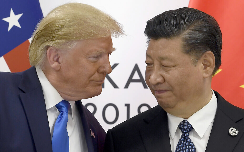 US President Donald Trump, left, meets with Chinese President Xi Jinping during a meeting on the sidelines of the G-20 summit in Osaka, western Japan, June 29, 2019. (AP Photo/Susan Walsh, File) US President Donald Trump, left, meets with Chinese President Xi Jinping during a meeting on the sidelines of the G-20 summit in Osaka, western Japan, June 29, 2019. (AP Photo/Susan Walsh, File)