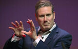 Labour's Keir Starmer gestures, during the Labour leadership hustings at the SEC centre, in Glasgow, Scotland, Saturday, Feb. 15, 2020 (Jane Barlow/PA via AP)