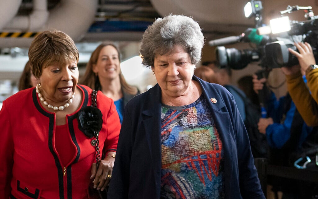 Rep. Eddie Bernice Johnson, D-Texas, chair of the House Science, Space and Technology Committee, left, and Rep. Lois Frankel, D-Fla., on Capitol Hill in Washington, March 11, 2020. (AP Photo/J. Scott Applewhite)