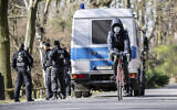 [Illustrative] German police patrol to make sure that the distance regulations are observed during the coronavirus outbreak in Berlin, Germany, Monday, March 23, 2020. (Michael Kappeler/dpa via AP)