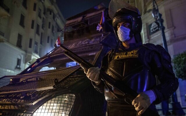 Egyptian security forces cordon off roads during curfew hours as prevention measures due to the coronavirus outbreak, in Cairo, Egypt, March 29, 2020 (AP Photo/Nariman El-Mofty) Egyptian security forces cordon off roads during curfew hours as prevention measures due to the coronavirus outbreak, in Cairo, Egypt, March 29, 2020 (AP Photo/Nariman El-Mofty)