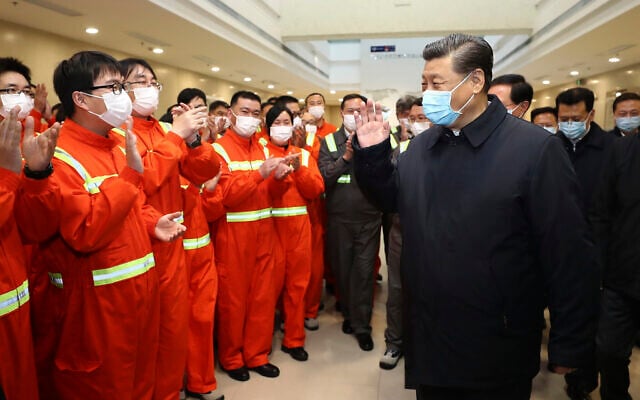 In this photo released by Xinhua News Agency, Chinese President Xi Jinping visits the Chuanshan port area of the Ningbo-Zhoushan Port in east China's Zhejiang Province, Sunday, March 29, 2020 (Ju Peng/Xinhua via AP) In this photo released by Xinhua News Agency, Chinese President Xi Jinping visits the Chuanshan port area of the Ningbo-Zhoushan Port in east China's Zhejiang Province, Sunday, March 29, 2020 (Ju Peng/Xinhua via AP)