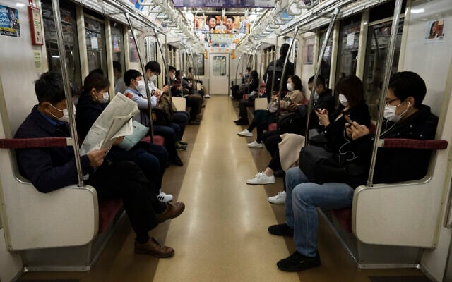 Commuters ride a train in Tokyo, April 7, 2020. (Jae C. Hong/AP) Commuters ride a train in Tokyo, April 7, 2020. (Jae C. Hong/AP)