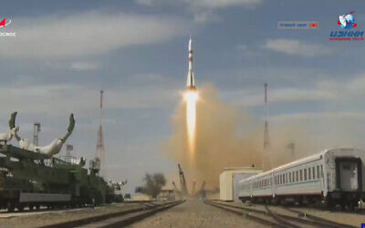 In this grab taken from video footage released by Roscosmos Space Agency,  the Soyuz-2.1a rocket booster with Soyuz MS-16 space ship carrying a new crew to the International Space Station, ISS, blasts off at the Russian leased Baikonur cosmodrome, Kazakhstan, April 9, 2020 (Roscosmos Space Agency via AP)