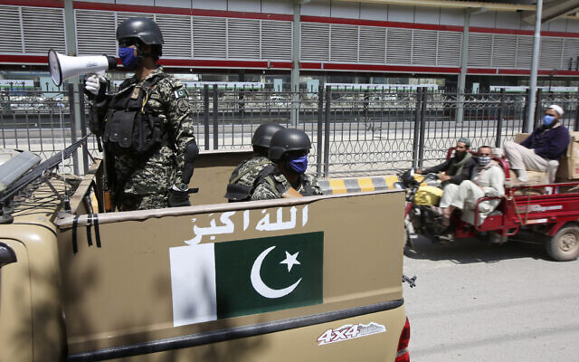 Pakistani soldiers patrol during a government-imposed nationwide lockdown to help contain the spread of coronavirus, in Peshawar, Pakistan, Thursday, April 9, 2020. (AP/Muhammad Sajjad) Pakistani soldiers patrol during a government-imposed nationwide lockdown to help contain the spread of coronavirus, in Peshawar, Pakistan, Thursday, April 9, 2020. (AP/Muhammad Sajjad)