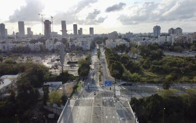Roads are empty during a lockdown to help stop the spread of the coronavirus, in Tel Aviv, April 9, 2020. (AP Photo/Ariel Schalit)