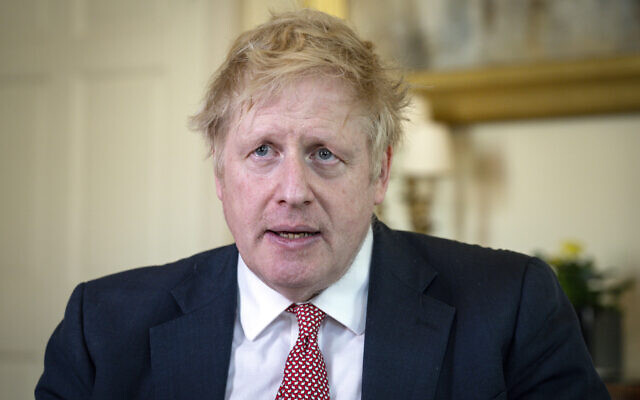 Britain's Prime Minister Boris Johnson speaks from 10 Downing Street praising NHS staff in a video message, after he was discharged from hospital a week after being admitted with persistent coronavirus symptoms, in London, April 12, 2020 (Pippa Fowles/10 Downing Street via AP) Britain's Prime Minister Boris Johnson speaks from 10 Downing Street praising NHS staff in a video message, after he was discharged from hospital a week after being admitted with persistent coronavirus symptoms, in London, April 12, 2020 (Pippa Fowles/10 Downing Street via AP)