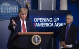 US President Donald Trump speaks about the coronavirus, accompanied by Dr. Anthony Fauci, director of the National Institute of Allergy and Infectious Diseases, in the James Brady Press Briefing Room of the White House, Thursday, April 16, 2020, in Washington. (AP Photo/Alex Brandon)