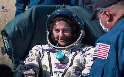 In this photo made from video footage released by Roscosmos space agency US astronaut Jessica Meir sits in a chair shortly after the landing of the Russian Soyuz MS-15 space capsule near the town of Dzhezkazgan, Kazakhstan, April 17, 2020 (Roscosmos Space Agency via AP)