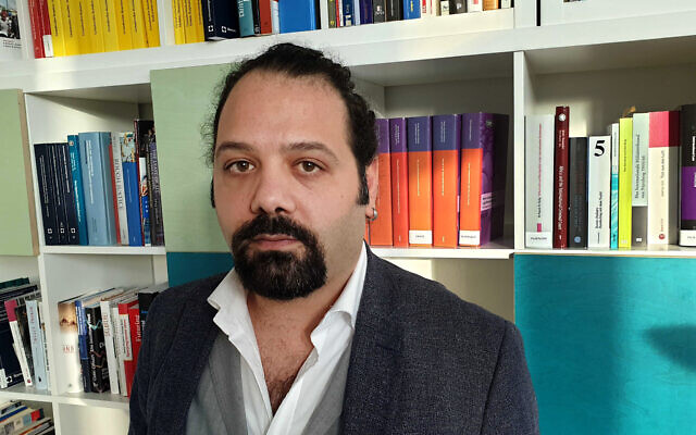 Syrian Wassim Mukdad at the Berlin offices of the European Center for Constitutional and Human Rights, Germany, April 19, 2020. (AP Photo/Frank Jordans) Syrian Wassim Mukdad at the Berlin offices of the European Center for Constitutional and Human Rights, Germany, April 19, 2020. (AP Photo/Frank Jordans)