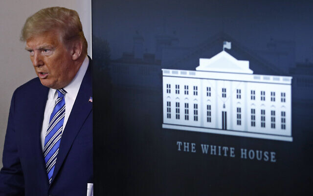 US President Donald Trump arrives to speak at a coronavirus task force briefing at the White House, in Washington, April 19, 2020. (Patrick Semansky/AP) US President Donald Trump arrives to speak at a coronavirus task force briefing at the White House, in Washington, April 19, 2020. (Patrick Semansky/AP)
