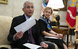 White House coronavirus response coordinator Dr. Deborah Birx listens as director of the National Institute of Allergy and Infectious Diseases Dr. Anthony Fauci speaks during a meeting between President Donald Trump and Gov. John Bel Edwards, D-La., about the coronavirus response, in the Oval Office of the White House, April 29, 2020, in Washington. (AP Photo/Evan Vucci)