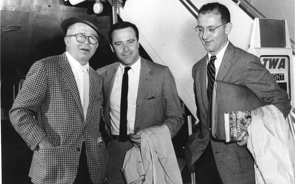 Producer and director Billy Wilder, left, actor Jack Lemmon, center, and writer I.A.L. Diamond are shown arriving at New York's International Airport on May 7, 1959. (AP Photo)