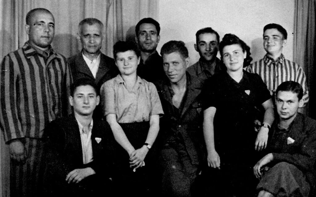 Abraham Perecman seated on right, with other survivors in
Schwabmünchen shortly after liberation.
(Courtesy Adam Frankel)