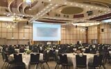 A dining hall is set up for a Passover Seder at Tel Aviv's Dan Panorama hotel on April 7, 2020. (Israel Defense Forces)