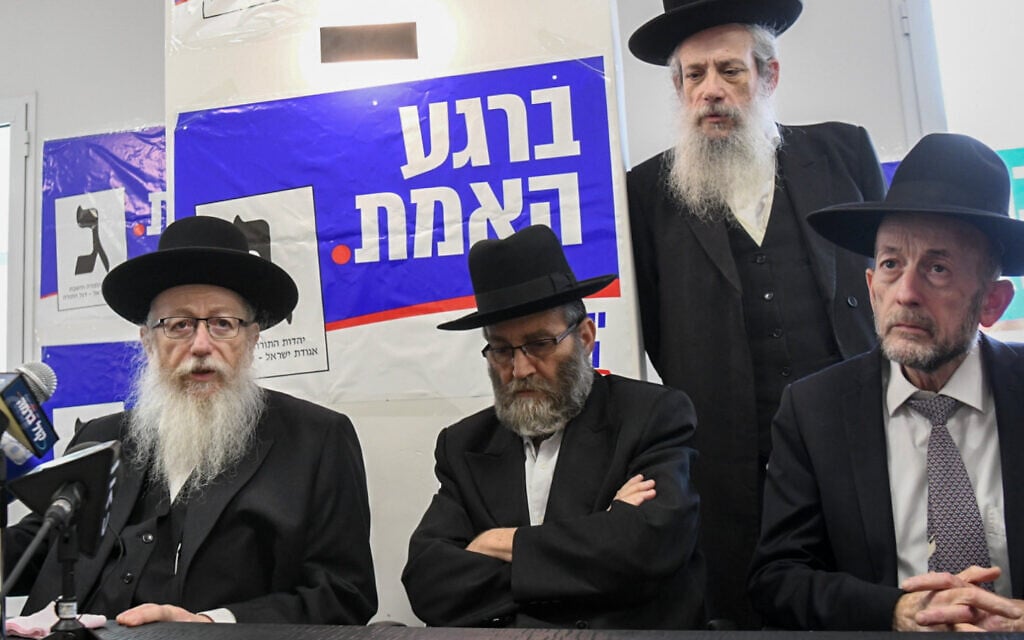 Health Ministe Yaakov Litzman (left) at an election campaign opening event for his United Torah Judaism party in Bnei Brak on May 30, 2019. The party slogan on the banner behind him reads 'At the moment of truth.' (Flash90) Health Ministe Yaakov Litzman (left) at an election campaign opening event for his United Torah Judaism party in Bnei Brak on May 30, 2019. The party slogan on the banner behind him reads 'At the moment of truth.' (Flash90)
