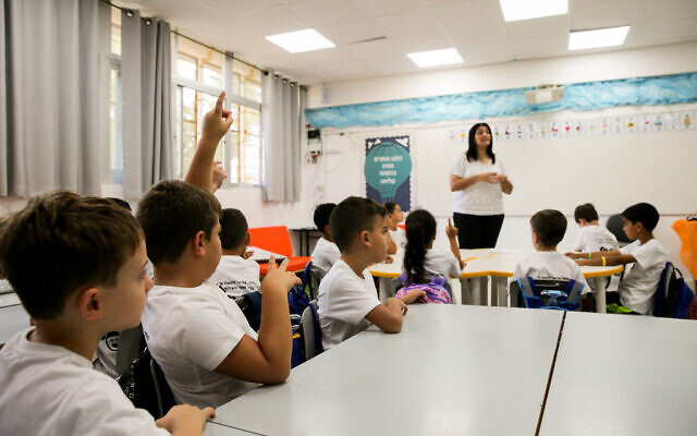 Illustrative: First grade students sit in a classroom on their first day of school at Hashalom elementary school in Mevaseret Zion, September 1, 2019. (Flash90) Illustrative: First grade students sit in a classroom on their first day of school at Hashalom elementary school in Mevaseret Zion, September 1, 2019. (Flash90)