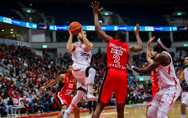 Illustrative: An Israeli Basketball Premier League game between Hapoel Tel Aviv and Hapoel Jerusalem at Pais Arena in Jerusalem on January 31, 2020. (Flash90)