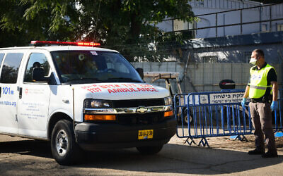 Illustrative: An ambulance brings an Israeli man who tested positive for the coronavirus to Sheba Medical Center at Tel Hashomer on February 27, 2020. (Flash90) Illustrative: An ambulance brings an Israeli man who tested positive for the coronavirus to Sheba Medical Center at Tel Hashomer on February 27, 2020. (Flash90)