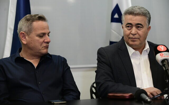 Labor Party leader Amir Peretz (R) and Meretz leader Nitzan Horowitz at a press conference in Tel Aviv on March 12, 2020. (Tomer Neuberg/Flash90) Labor Party leader Amir Peretz (R) and Meretz leader Nitzan Horowitz at a press conference in Tel Aviv on March 12, 2020. (Tomer Neuberg/Flash90)