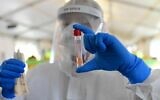 A lab test for coronavirus. (Tomer Neuberg/ Flash90)