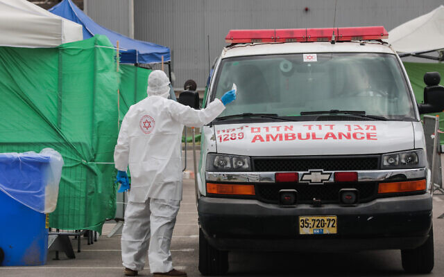 The Magen David Adom national emergency service at a coronavirus testing complex in Bnei Brak on April 1, 2020 (Yossi Zamir/Flash90) The Magen David Adom national emergency service at a coronavirus testing complex in Bnei Brak on April 1, 2020 (Yossi Zamir/Flash90)