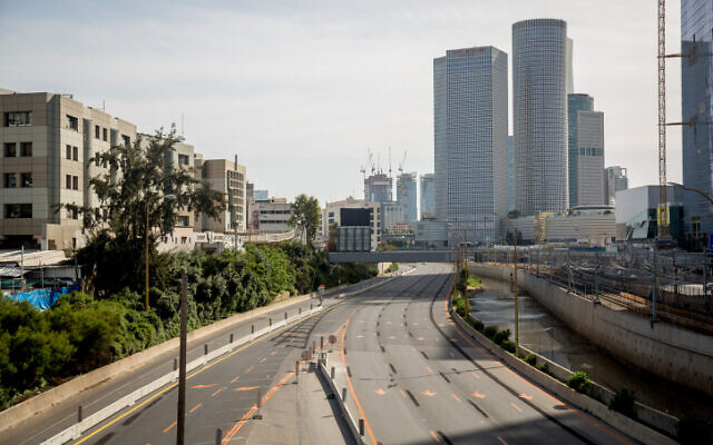 Illustrative: The empty Ayalon highway in Tel Aviv on April 4, 2020 (Miriam Alster/Flash90)