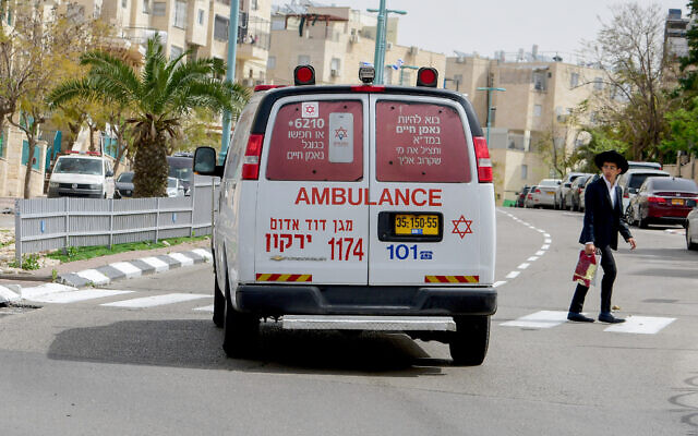 Illustrative: An ambulance driving in the central Israeli city of Elad, April 5, 2020. (Avshalom Sassoni/Flash90) Illustrative: An ambulance driving in the central Israeli city of Elad, April 5, 2020. (Avshalom Sassoni/Flash90)