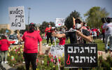Self-employed Israelis participate in a rally calling for financial support from the government outside the Knesset in Jerusalem, on April 19, 2020. (Yonatan Sindel/Flash90)