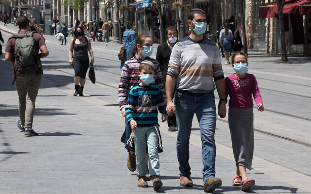 People on Jaffa Street in downtown Jerusalem on April 26, 2020. (Nati Shohat/Flash90) People on Jaffa Street in downtown Jerusalem on April 26, 2020. (Nati Shohat/Flash90)