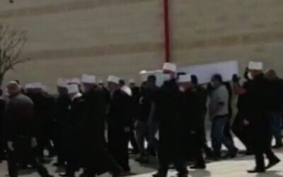 Screen capture from video of a funeral in the Arab Israeli town of Isfiya, April 15, 2020. (Channel 12 news)