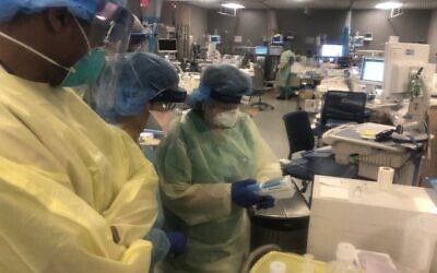 Many healthcare workers on the front lines are unable to hug their own children. (Courtesy Dr. Ram Roth)