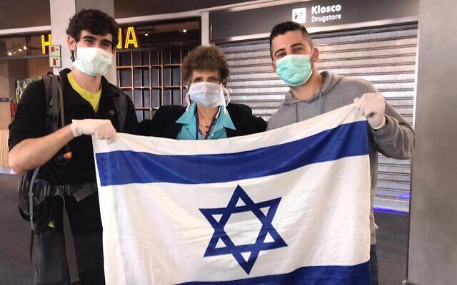 Galit Ronen, center, Israel's ambassador to Argentina, at the Ezeiza International Airport in Buenos Aires with two passengers on a flight to Israel amid coronavirus crisis, April 19, 2020. (Courtesy of the Israeli Embassy in Argentina) Galit Ronen, center, Israel's ambassador to Argentina, at the Ezeiza International Airport in Buenos Aires with two passengers on a flight to Israel amid coronavirus crisis, April 19, 2020. (Courtesy of the Israeli Embassy in Argentina)